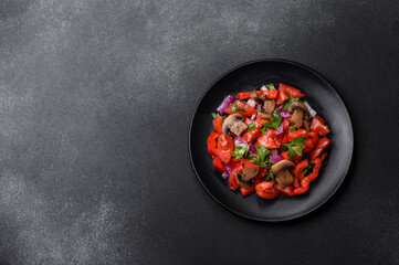 A salad of baked mushrooms, tomatoes, onions, parsley, spices and herbs