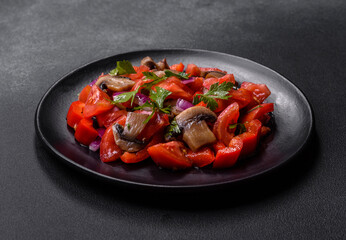 A salad of baked mushrooms, tomatoes, onions, parsley, spices and herbs