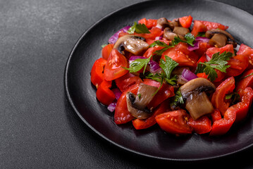 A salad of baked mushrooms, tomatoes, onions, parsley, spices and herbs
