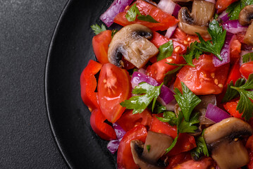 A salad of baked mushrooms, tomatoes, onions, parsley, spices and herbs