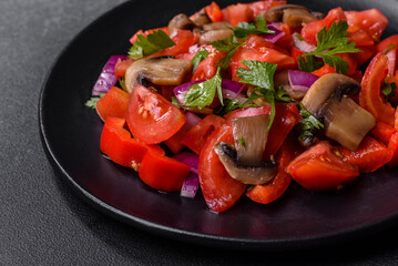 A salad of baked mushrooms, tomatoes, onions, parsley, spices and herbs