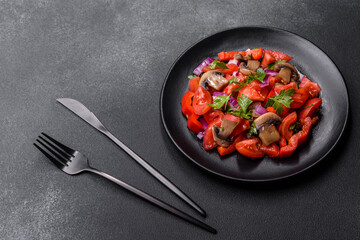 A salad of baked mushrooms, tomatoes, onions, parsley, spices and herbs