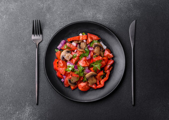 A salad of baked mushrooms, tomatoes, onions, parsley, spices and herbs