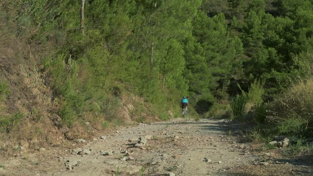 Gravel bike riding in nature,  gravel road biking, Costa Blanca, Spain - stock video