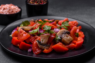 A salad of baked mushrooms, tomatoes, onions, parsley, spices and herbs