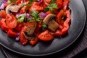 A salad of baked mushrooms, tomatoes, onions, parsley, spices and herbs