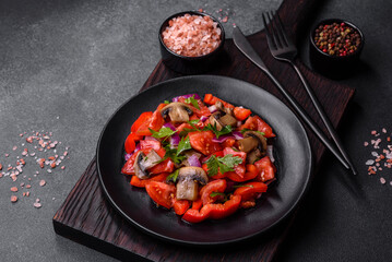 A salad of baked mushrooms, tomatoes, onions, parsley, spices and herbs