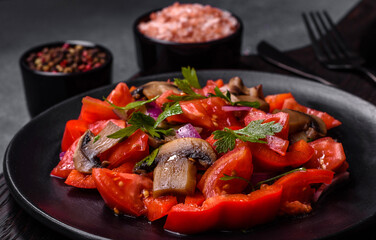 A salad of baked mushrooms, tomatoes, onions, parsley, spices and herbs