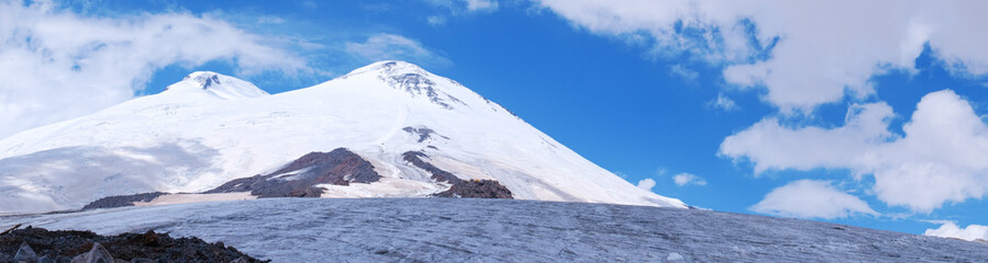 panorama of the top of Elbrus, the vicinity of the Elbrus.selective focus, mountains, snow, tent,rest.