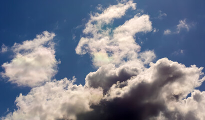 Clouds in dramatic blue sky.
