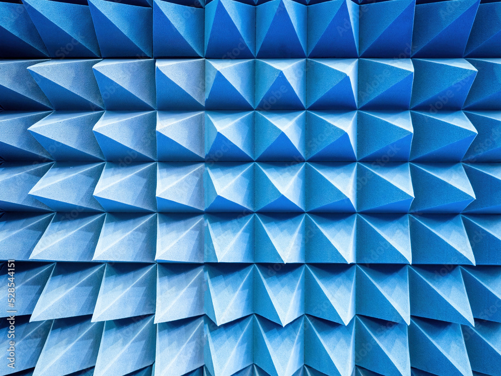 Poster blue background. geometric elements for design. blue pyramids close-up. abstract background texture.