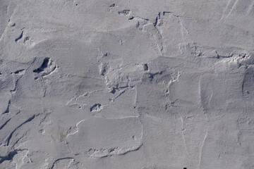 Abstract background, gray concrete pavement texture closeup.