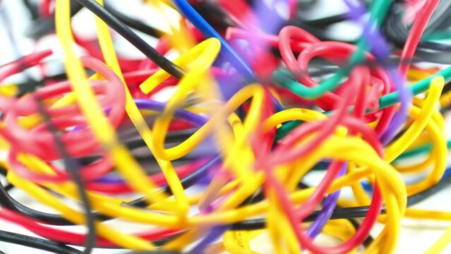 multicolored wire cable of usb and adapter isolated on white background.Electronic Connector.Selection focus.Slow motion macro footage.