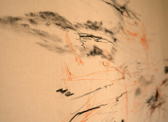 Selective focus on an abstract modern painting drawn in manila paper.