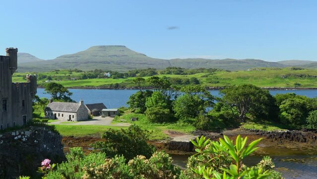 Beautiful view from Dunvegan castle in Isle Skye with greenery and a waterscape