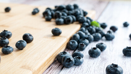 Fresh blueberries scattered on the surface. selective focus