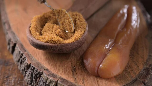 Bottarga, dried roe of mullet. Sardinian Food. FOR A dish with traditional Italian pasta from the South, dried sardine roe, and thin pasta. High quality footage 4k