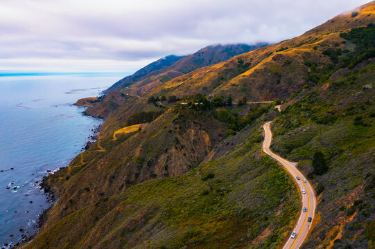 Aerial view of the Pacific Coast Highway going along the coastline of California