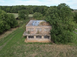 
Aerial view of World war two military airfield control tower at Forma RAF Woolfox Lodge Aerodrome. Rutland, England. Royal Air Force Woolfox Lodge or more simply RAF Woolfox Lodge 