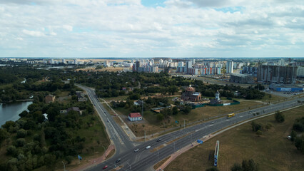 Multi-lane city highway. Multi-storey buildings in the suburbs. Aerial photography.