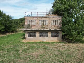 
Aerial view of World war two military airfield control tower at Forma RAF Woolfox Lodge Aerodrome. Rutland, England. Royal Air Force Woolfox Lodge or more simply RAF Woolfox Lodge 