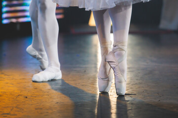 Ballet dancers couple during performance repetition, classic ballet rehearsal practicing in...