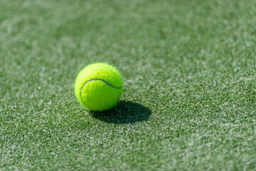 Tennis ball on tennis court. Horizontal education and sport poster, greeting cards, headers, website.