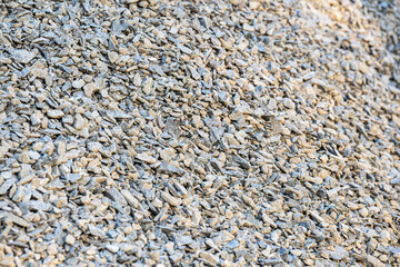 A pile of fine gray stone gravel