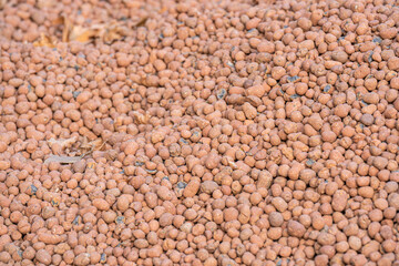 A pile of small red clay stone