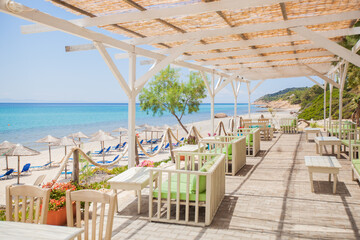Waterfront Restaurant. Beachfront View. Summer Seascape. Picture-perfect Postcard Moment. Feast For...