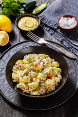 shout hallelujah potato salad in black bowl