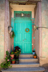 Bozcaada's Greek Quarter is very striking with its well-kept houses, beautiful doors, and thousands of flowers.
