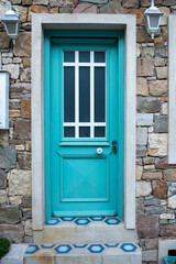 Bozcaada's Greek Quarter is very striking with its well-kept houses, beautiful doors, and thousands of flowers.
