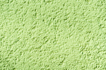 Green cracks background. Scratched lines texture. Grunge concrete wall pattern for graphic design. Peel paint crack. Dry paint overlay. Vibrant color green paint. Stucco wall structure.
