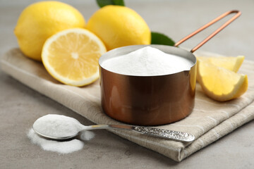 Baking soda and cut lemons on light table