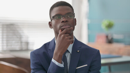 Pensive Young African Businessman Thinking