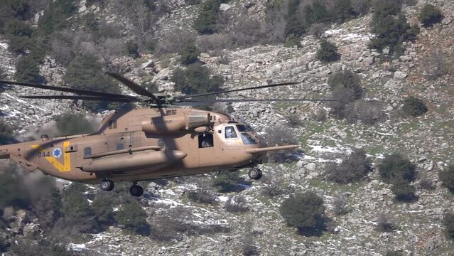 Idf Military CH-53 Sea Stallion Flying over Hermon Mountain
Israeli force in Action, Israel,golan Heights,February,16,2022, Slow motion shot
