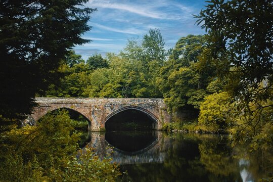 Beautiful view of a bridge over River Almond in Cramond, Edinburgh