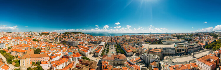 Fototapeta na wymiar High definition Ultra wide angle aerial drone view of Baixa District in Lisbon, Portugal with major landmarks visible