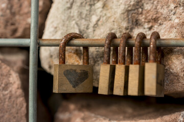 Metal locks. A bunch of locks. Heart locks. A symbol of love