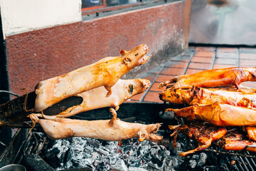 grilled cuy barbecue at ecuadorian market