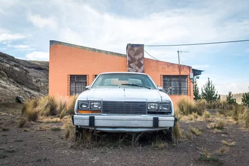 Fotobehang abandoned car next to route 66 © jon_chica