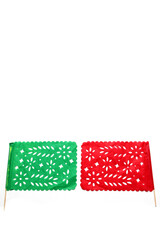 Mexican party pennants handmade with green and red cut-out paper like the flag of Mexico to celebrate the national holidays of independence on a white background