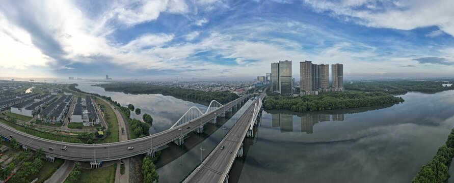 Panoramic cityscape of Pantai Indah Kapuk, Jakarta, on a cloudy day