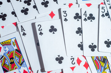 Casino cards poker blackjack,hand holding poker chips with copy space and deck card background