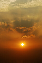 Scenic view dramatic beautiful sunset sky. Natural Sunset Sunrise on meadow silhouette shadow dark land. Vibrant dramatic sky on sunset, dawn, sunrise in Countryside. Landscape Colorful Sky At Sunset
