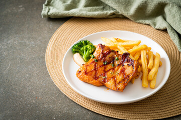 grilled chicken steak with potato chips or french fries