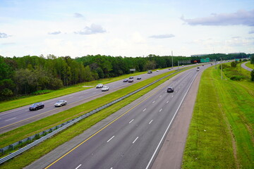 Fototapeta premium Tampa, FL, USA - 09 01 2022: Aerial view of A beautiful highway in Florida 