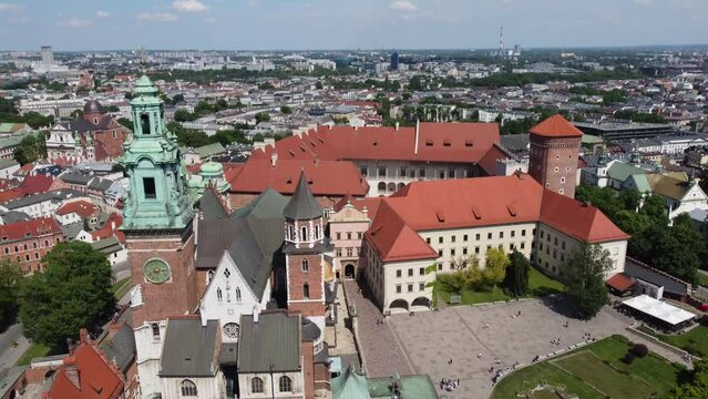 Flyover of the Wawel Royal Castle Cathedral on the Vistula (Wisła) River - Krakow, Poland, a Polish cultural capital, medieval and renaissance architecture, city center - 4K 30FPS Tracking Up