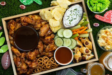 Fototapeta na wymiar Close up of healthy Football game day tail gate party tray filled with snacks and finger foods for friends and family fun.
